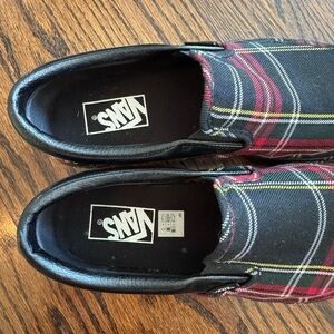Plaid platform Vans slip on shoes.